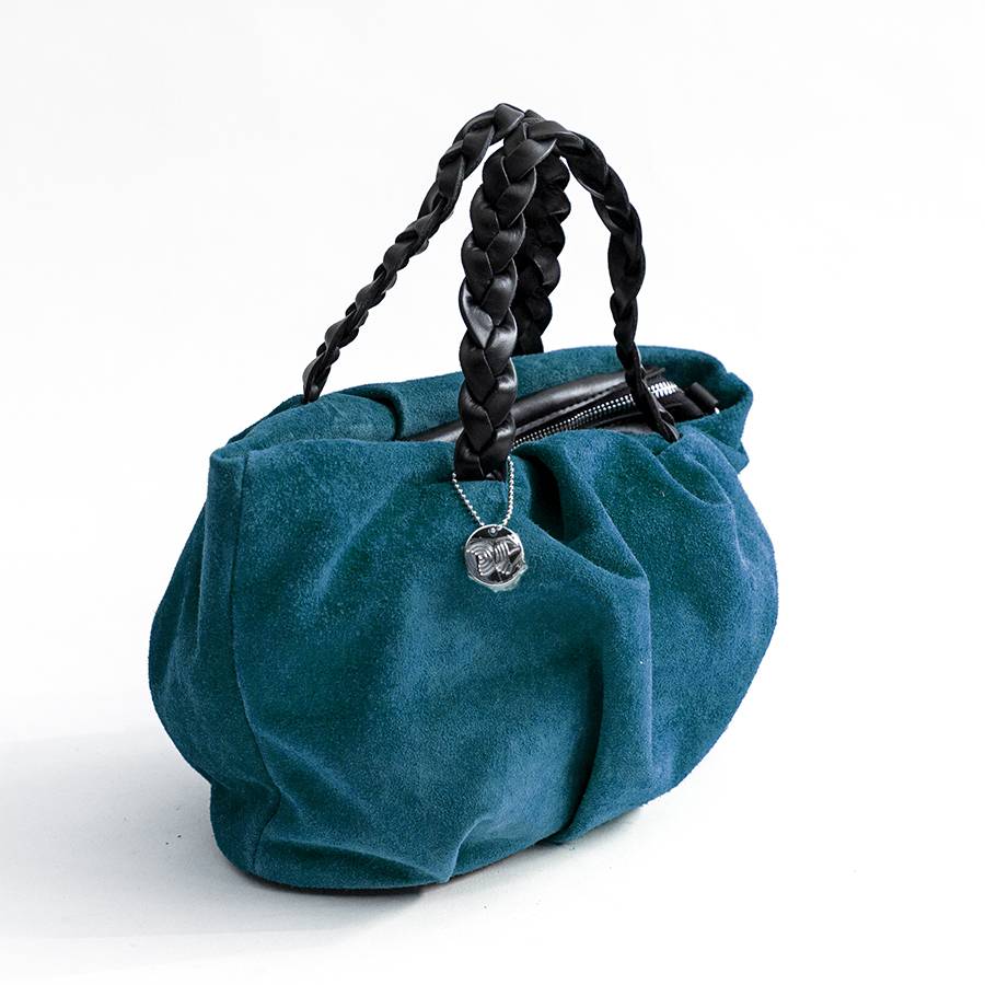 Laura Di Maggio TENDER – Bauletto con manico a treccia in camoscio petrolio Acquista Ora
