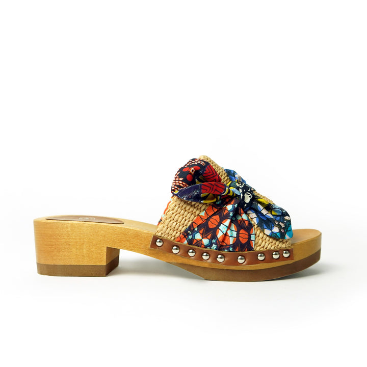 Roberta Gandolfi Lola Sabot sandali in legno con rafia e pelle di vitello con fiocco stampa african Presa