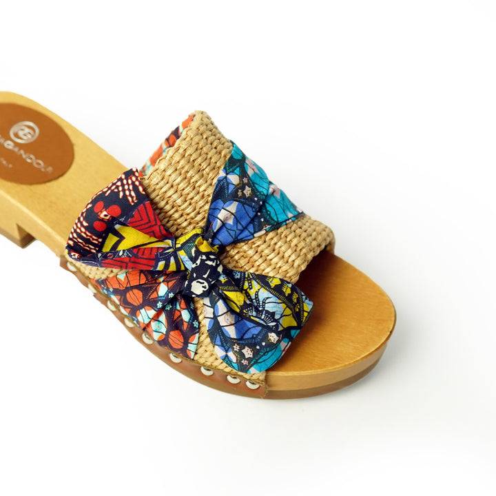 Roberta Gandolfi Lola Sabot sandali in legno con rafia e pelle di vitello con fiocco stampa african Presa