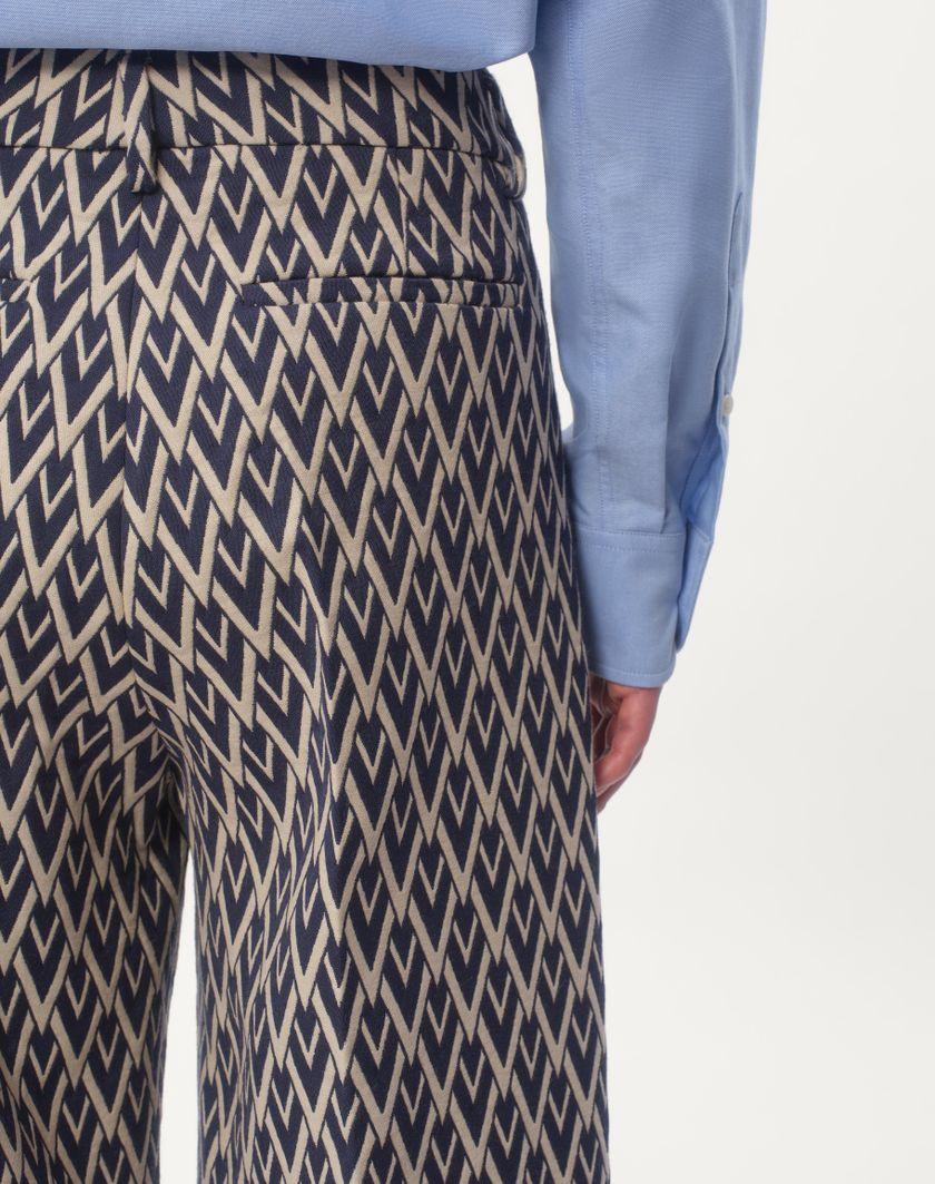 Valentino Handbags Pantalone In Lana Con Risvolto Con Motivo Jacquard Toute La V per Uomo in Notte/crema | Valentino IT Italy