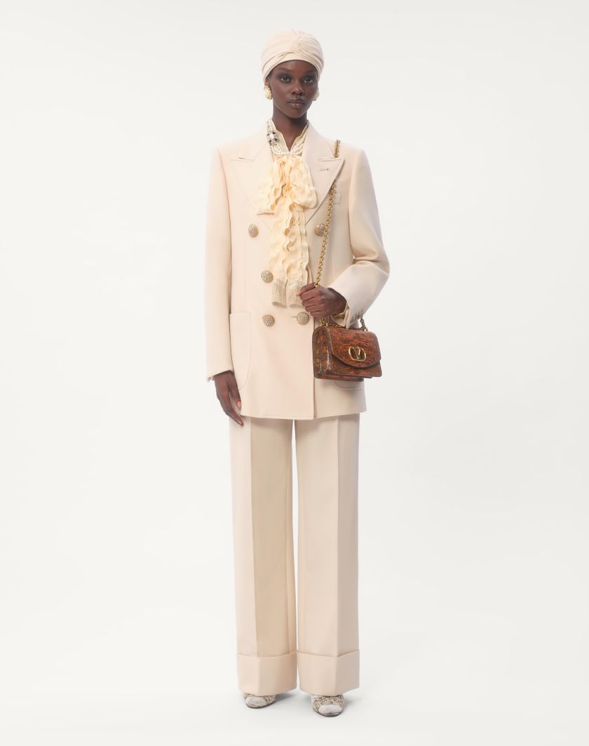 Valentino Handbags Pantaloni In Diagonal Dry Wool per Donna in Avorio | Valentino IT Presa