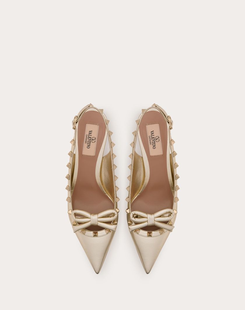 Valentino Handbags Décolleté Slingback Rockstud Bow In Nappa Laminata E Borchie In Tono 60mm per Donna in Platino | Valentino IT Offerta natalizia