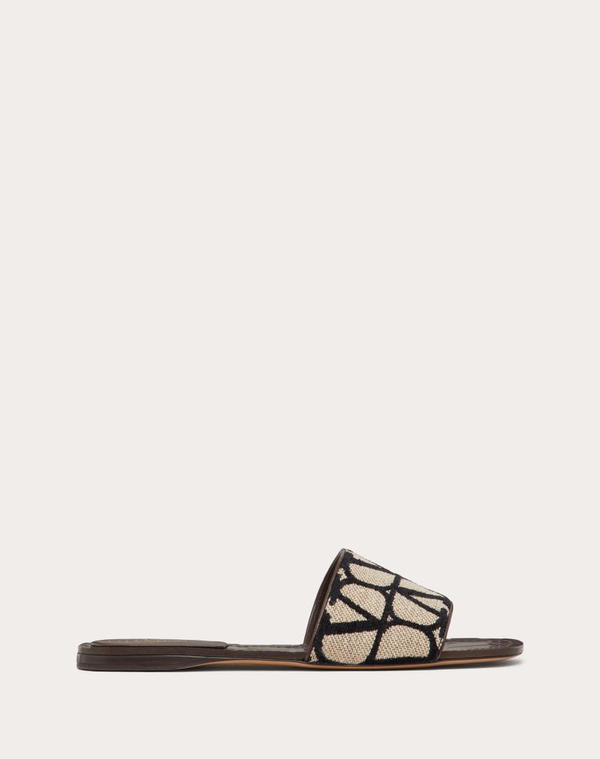 Valentino Handbags Sandalo Slide In Toile Iconographe per Donna in Beige/nero | Valentino IT Latest fashion