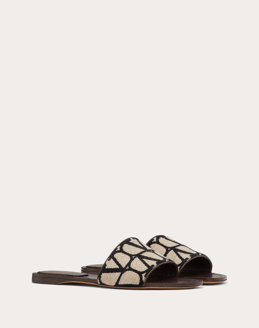 Valentino Handbags Sandalo Slide In Toile Iconographe per Donna in Beige/nero | Valentino IT Latest fashion