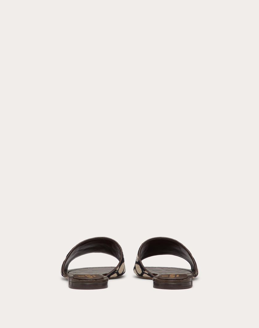 Valentino Handbags Sandalo Slide In Toile Iconographe per Donna in Beige/nero | Valentino IT Latest fashion
