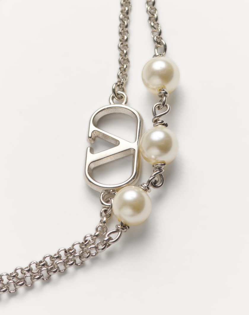 Valentino Handbags Bracciale Vlogo Signature In Metallo E Perle Swarovski® per Donna in Palladio/crystal | Valentino IT Ritorno libero