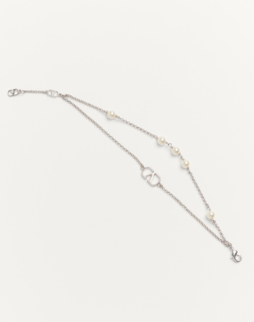 Valentino Handbags Bracciale Vlogo Signature In Metallo E Perle Swarovski® per Donna in Palladio/crystal | Valentino IT Ritorno libero